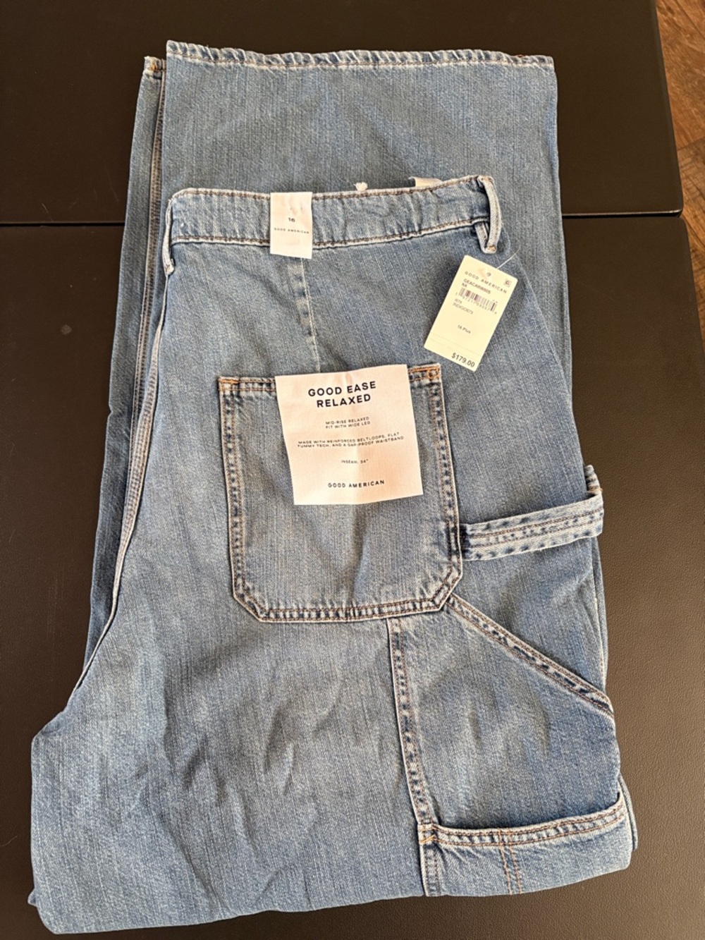 Good American Relaxed Flare Jeans in Light Blue Denim